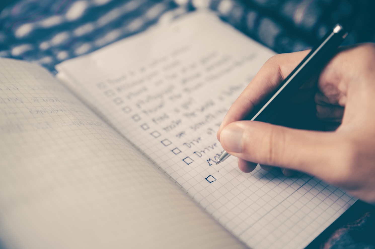 Written checklist on notepad